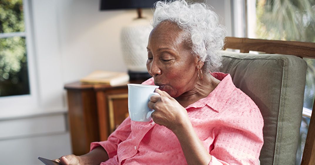 Woman drinking a cup of tea