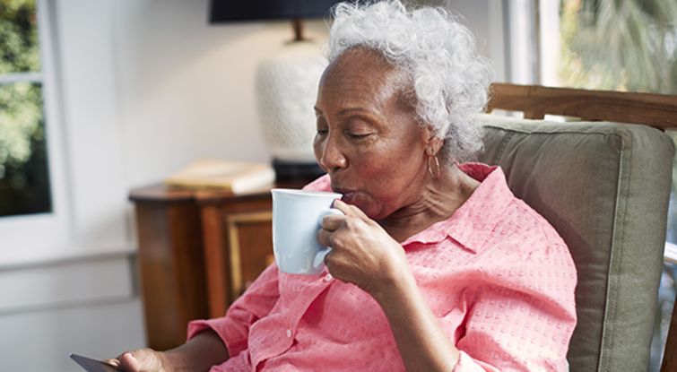 Woman drinking a cup of tea